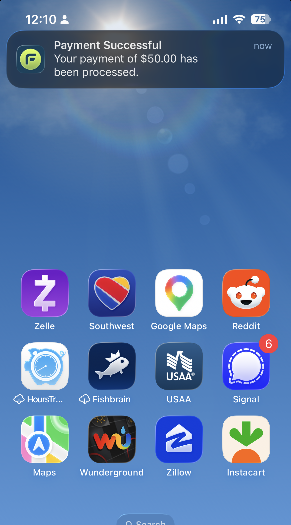 iPhone lock screen showing a FieldPay notification: Payment Successful, your payment of $50.00 has been processed